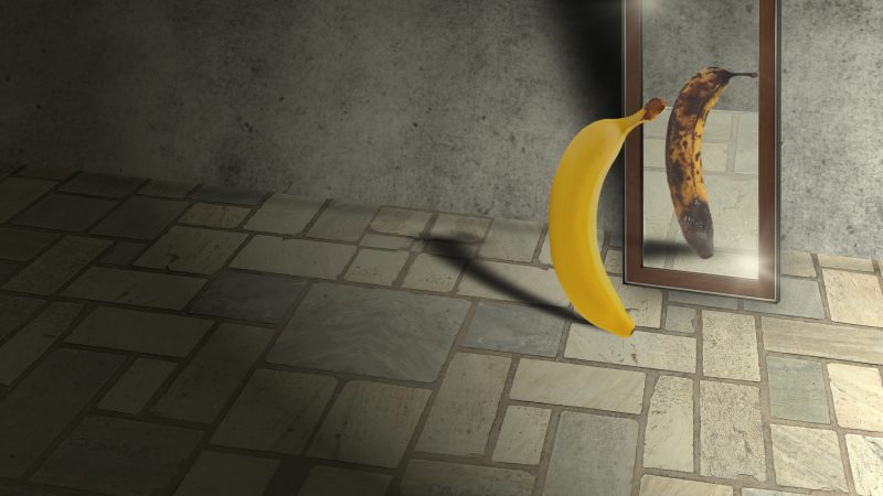 Banana with mirrored reflection of bruised version version of itself