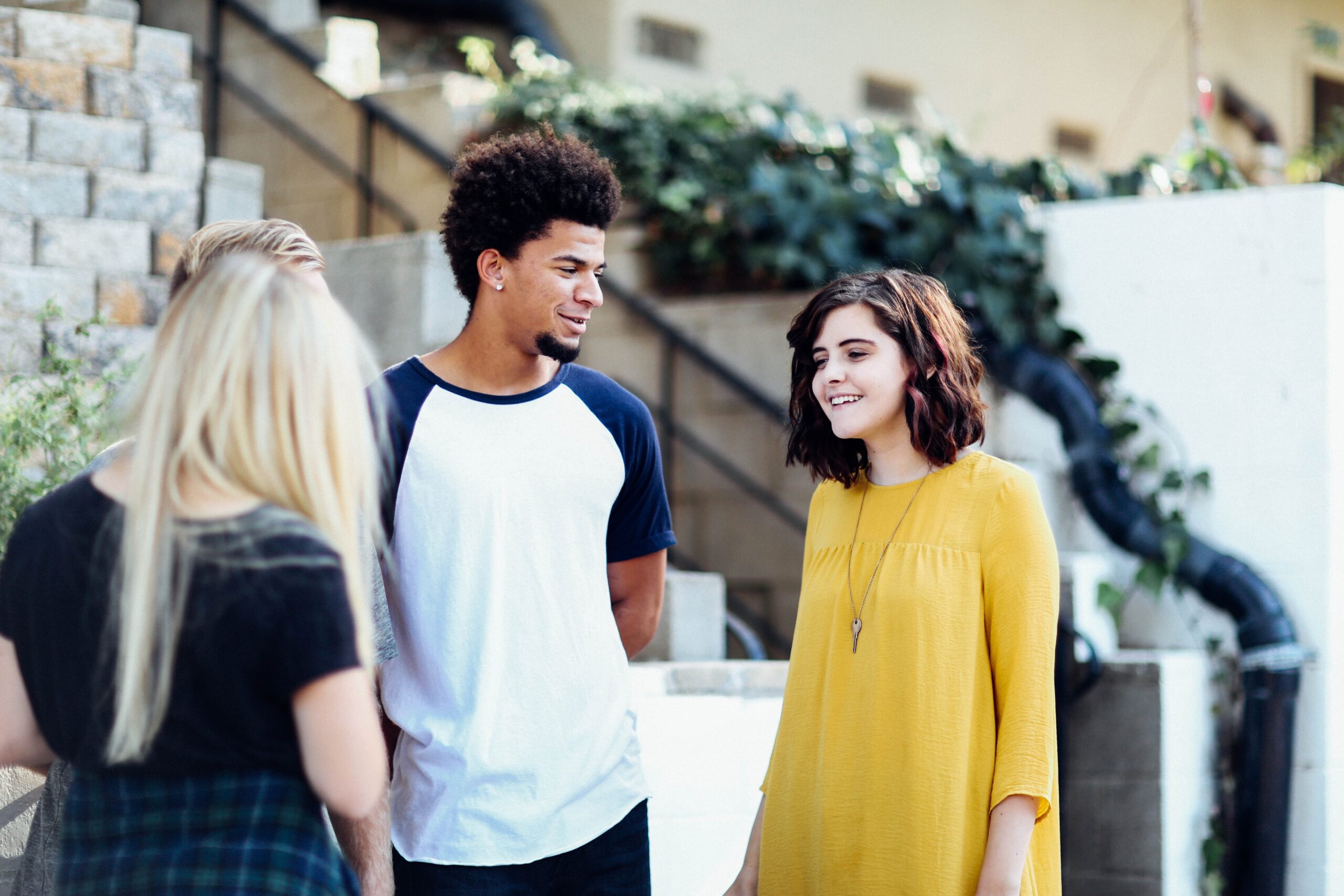 students talk outside