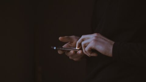 person uses phone