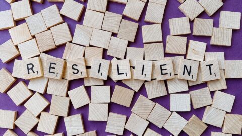 scrabble tiles spell resilient