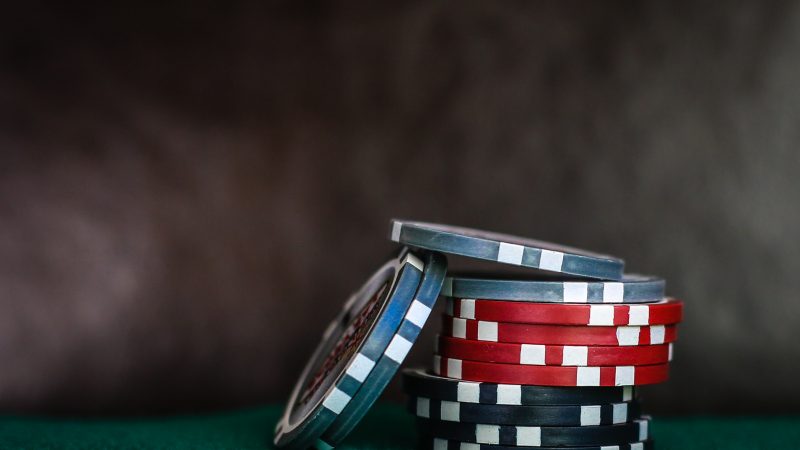 poker chips on green table