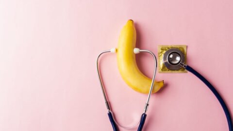 A banana and condom with a stethoscope on them