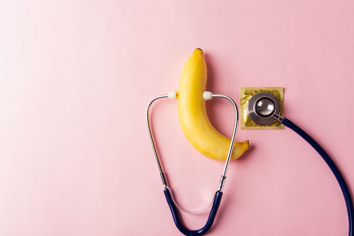 A banana and condom with a stethoscope on them